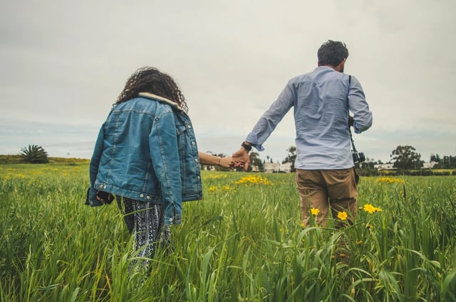 Volunteer walking through a field