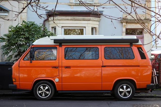 Campervan parked at a rural host property